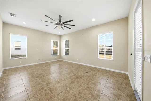 a view of a balcony with chairs