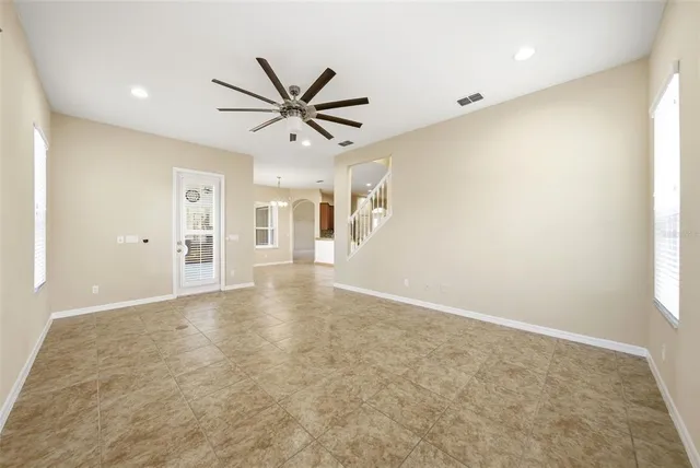 an aerial view of a house with swimming pool
