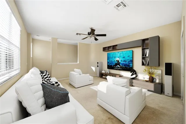 a kitchen with stainless steel appliances granite countertop a refrigerator sink and stove