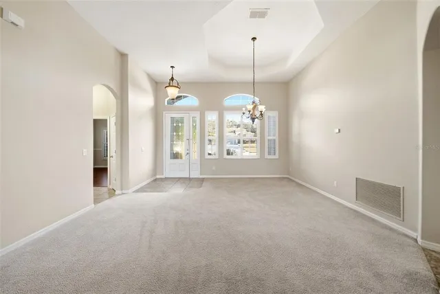 a view of a kitchen with a sink and a window