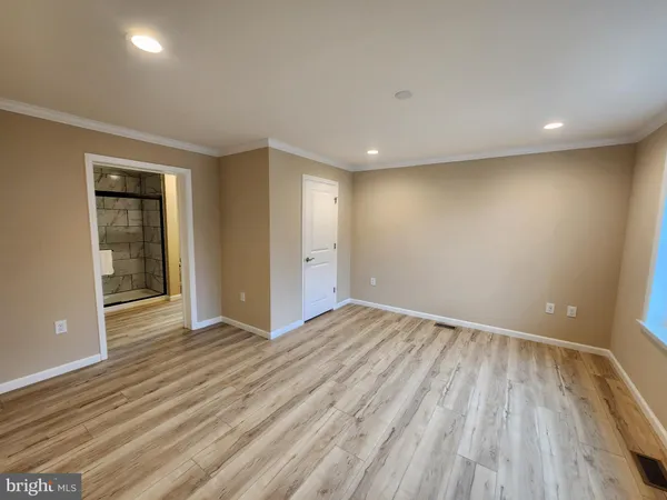 a view of livingroom with furniture and window