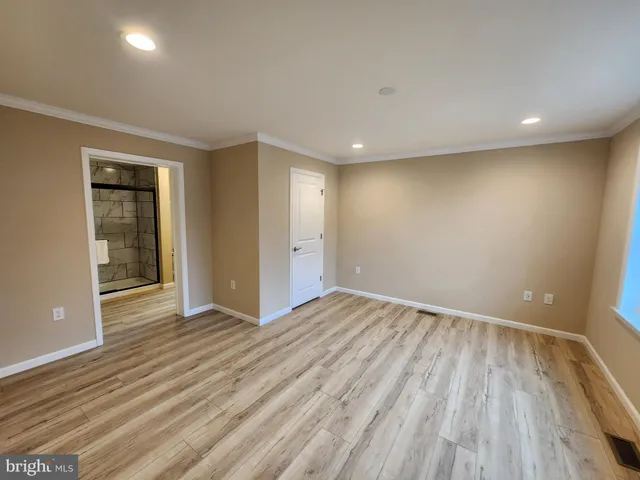 a view of livingroom with furniture and window