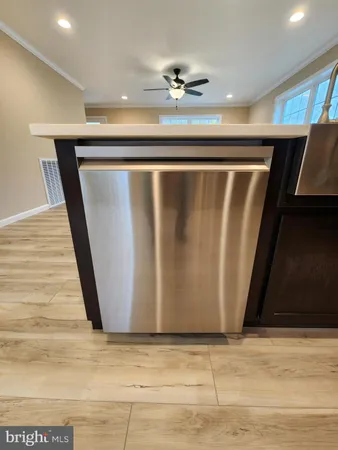 a bathroom with a sink vanity and a mirror