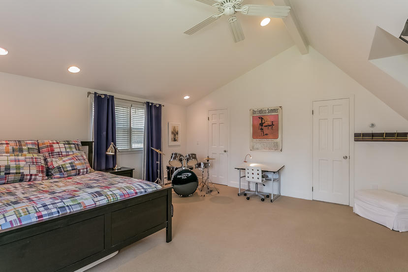 17 Miller Road Darien, CT 06820 - Photo 13 of 21 a bedroom with a bed and furniture