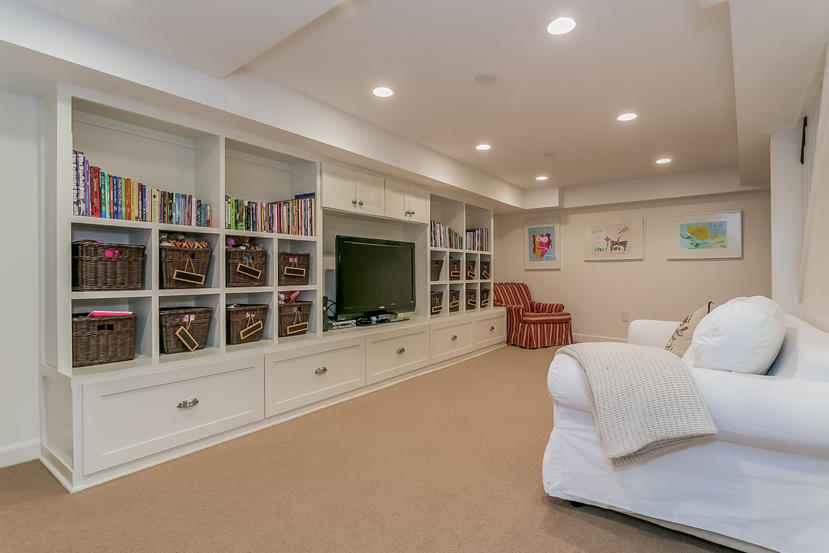 17 Miller Road Darien, CT 06820 - Photo 15 of 21 a living room with furniture potted plant and a flat screen tv