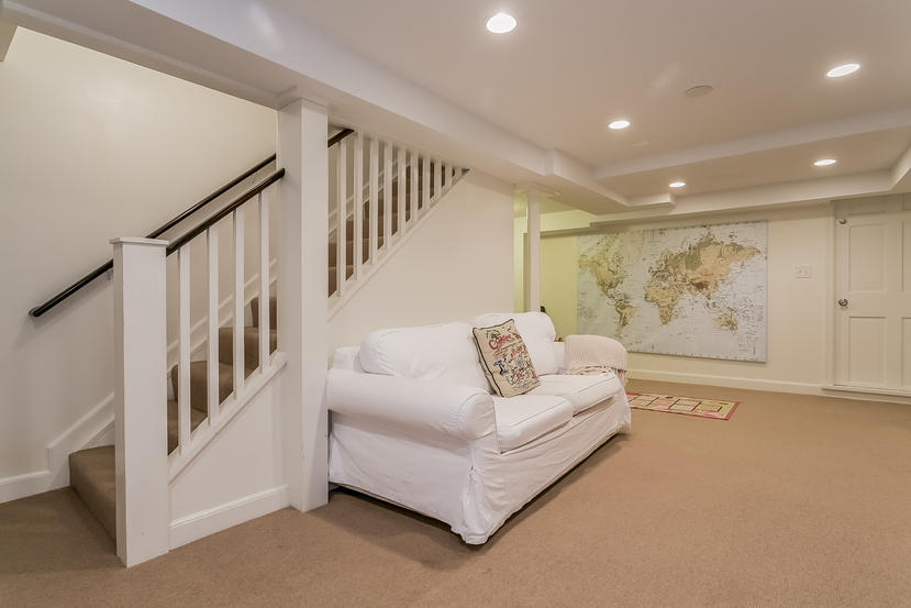 17 Miller Road Darien, CT 06820 - Photo 16 of 21 a living room with furniture and stairs