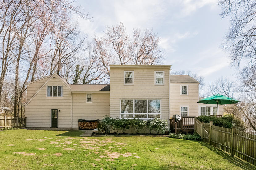 17 Miller Road Darien, CT 06820 - Photo 17 of 21 a front view of a house with a yard