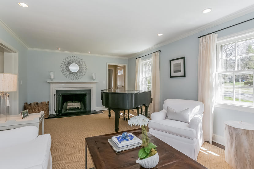 17 Miller Road Darien, CT 06820 - Photo 3 of 21 a living room with furniture and a fireplace