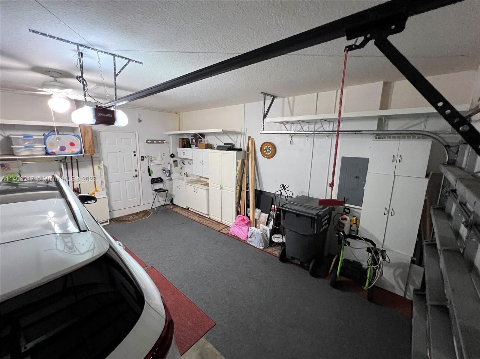 Oakridge Hollywood, FL 33312 - Photo 25 of 33 a utility room with dryer and washer