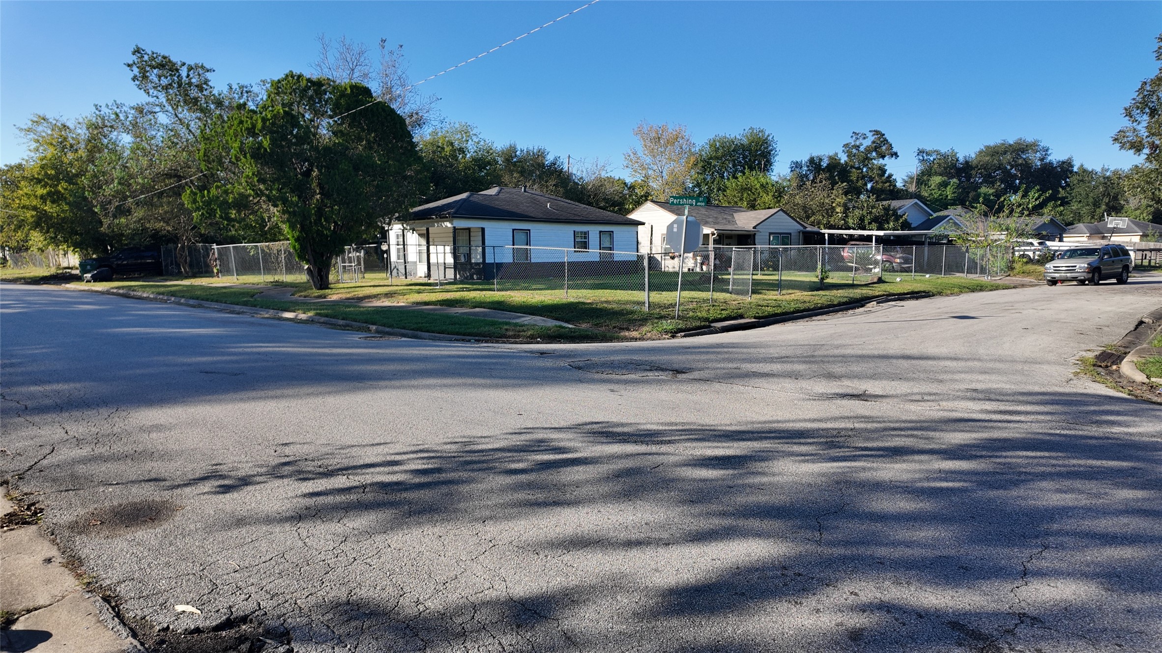 7358 Forrestal Street Houston, TX 77033 - Photo 20 of 25 a front view of a house with a yard