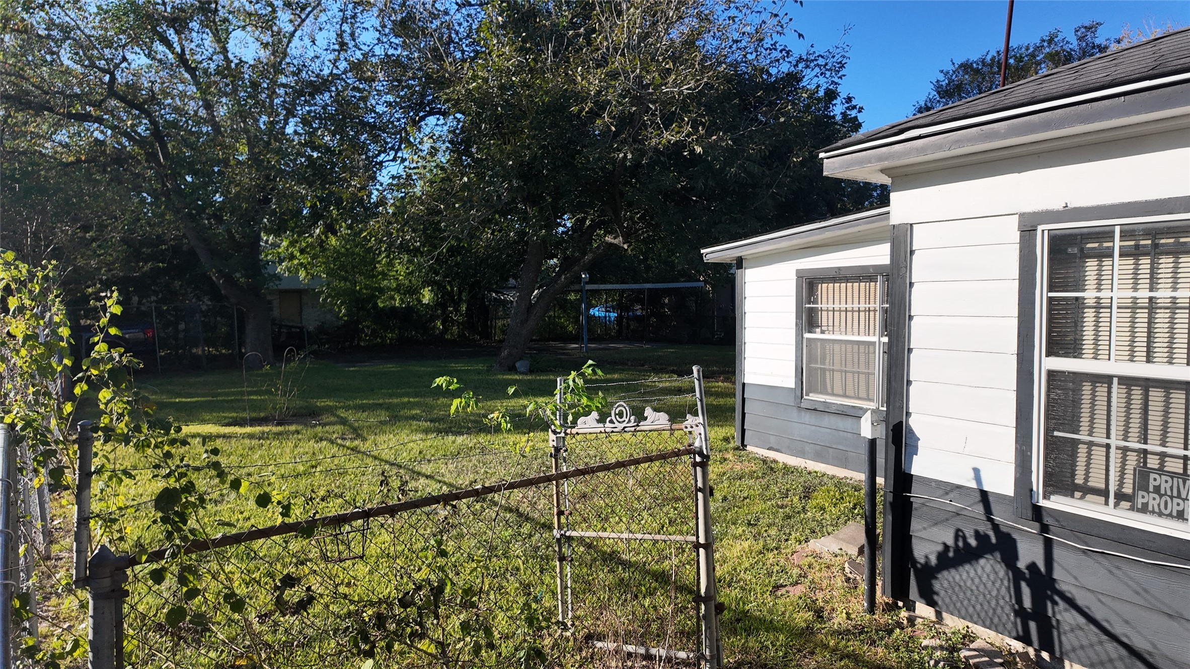7358 Forrestal Street Houston, TX 77033 - Photo 23 of 25 a view of backyard with swimming pool and seating space