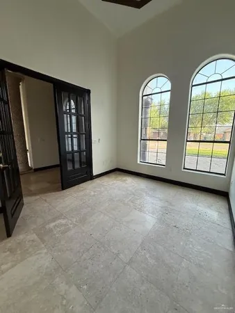 an empty room with windows