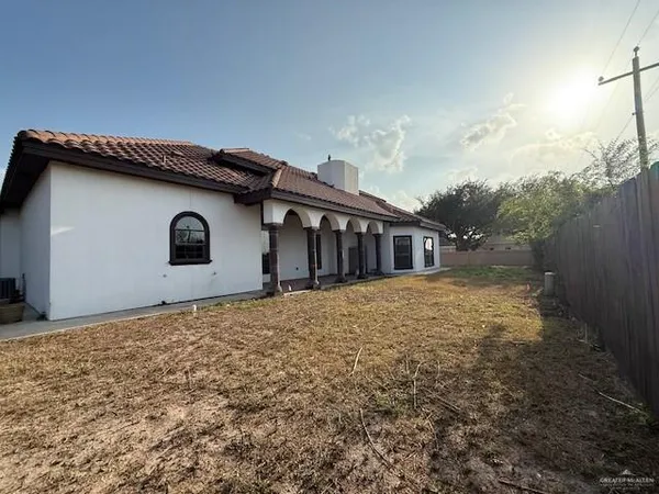 a house with yard in front of it