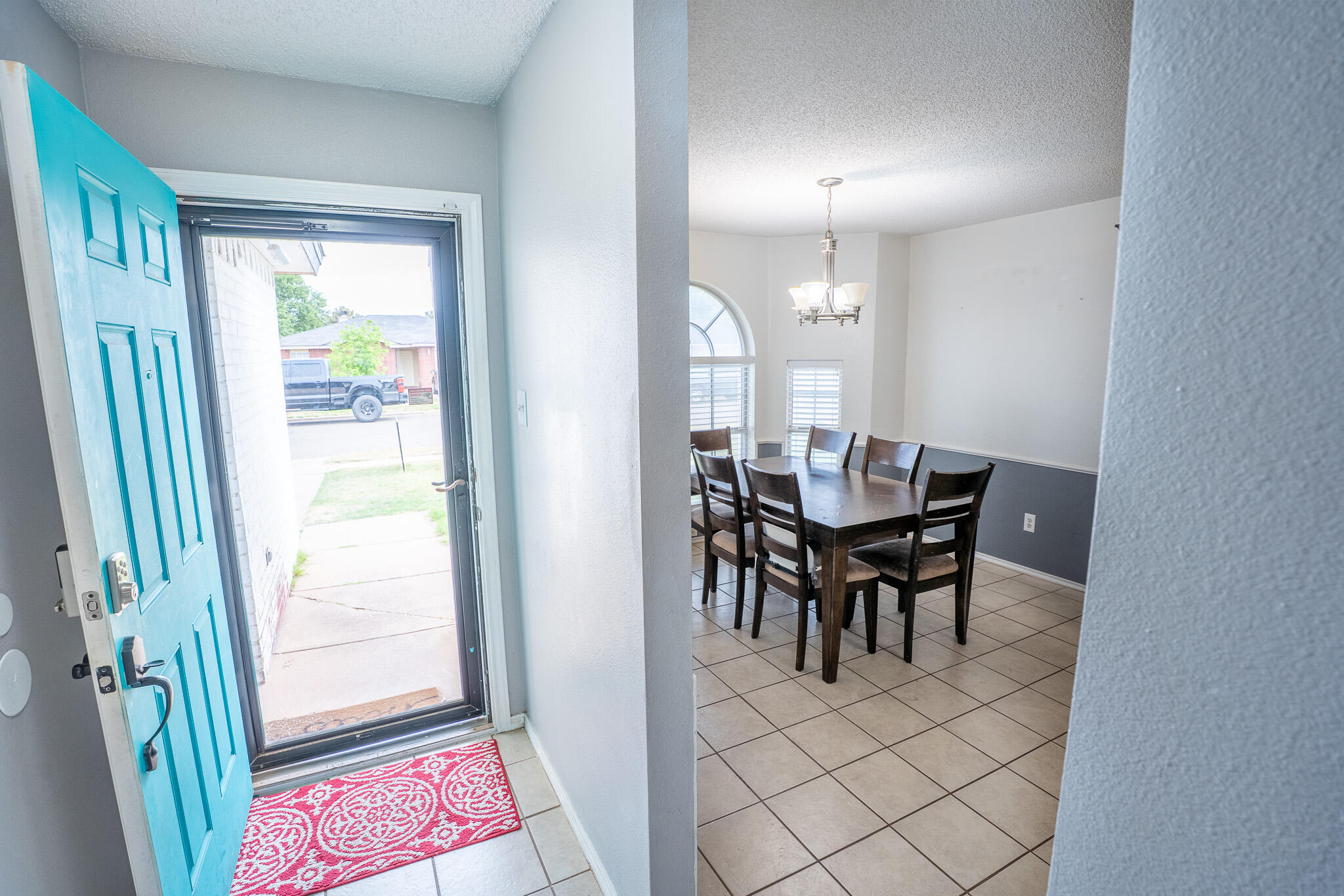 1609 78th Street Lubbock, TX 79423 - Photo 12 of 36 a dining room with furniture and window