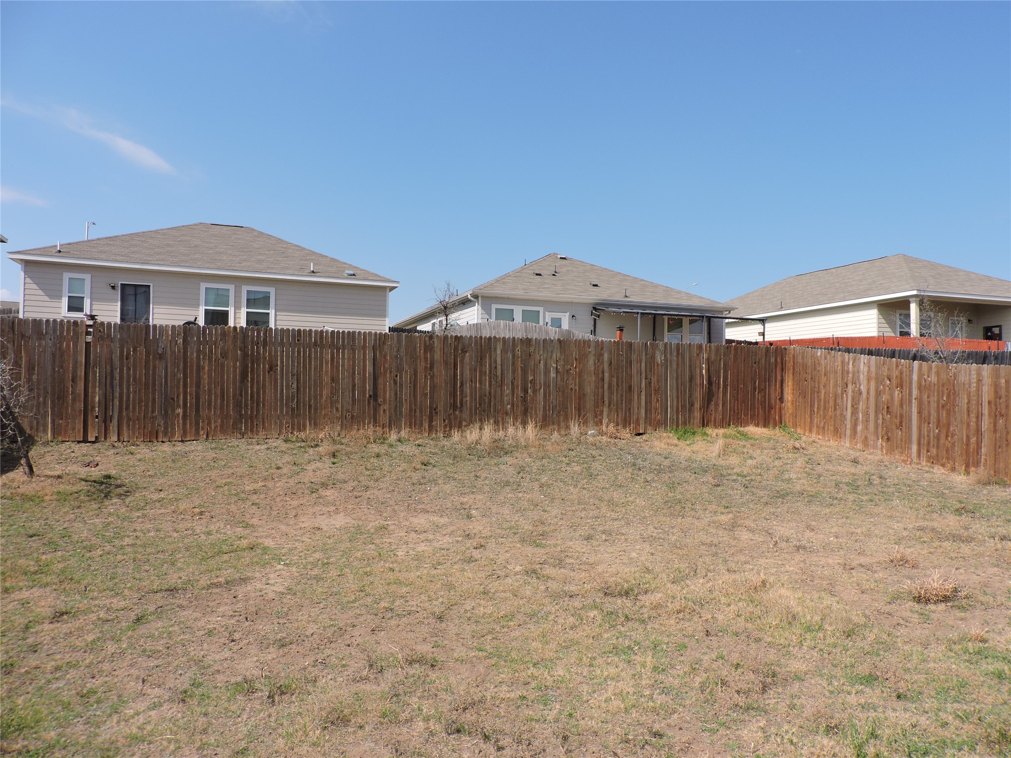 14120 Jeannette Rankin Rd Manor Manor, TX 78653 - Photo 21 of 25 View of fenced backyard