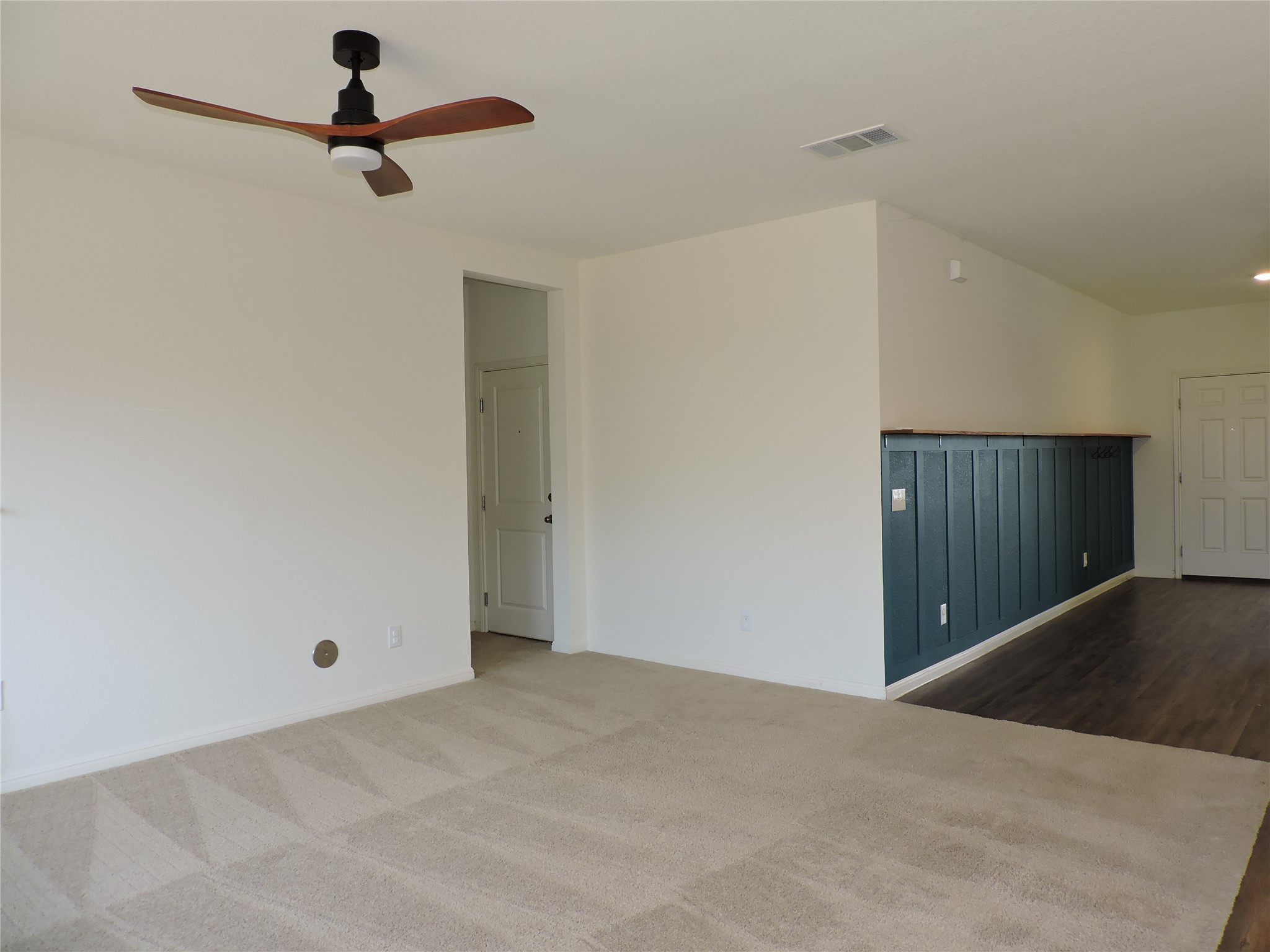 14120 Jeannette Rankin Rd Manor Manor, TX 78653 - Photo 8 of 25 Empty room featuring a ceiling fan and baseboards