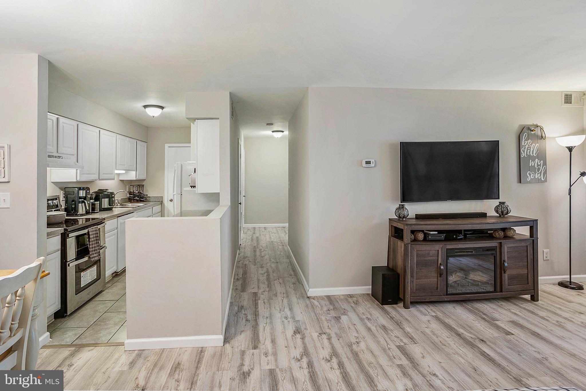 5904 Kingsford Road, Unit 422 Springfield, VA 22152 - Photo 9 of 28 Great flow into from Living Room into Bedrooms
