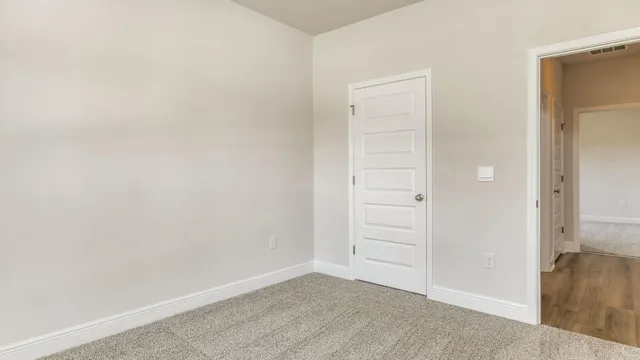 an empty room with closet
