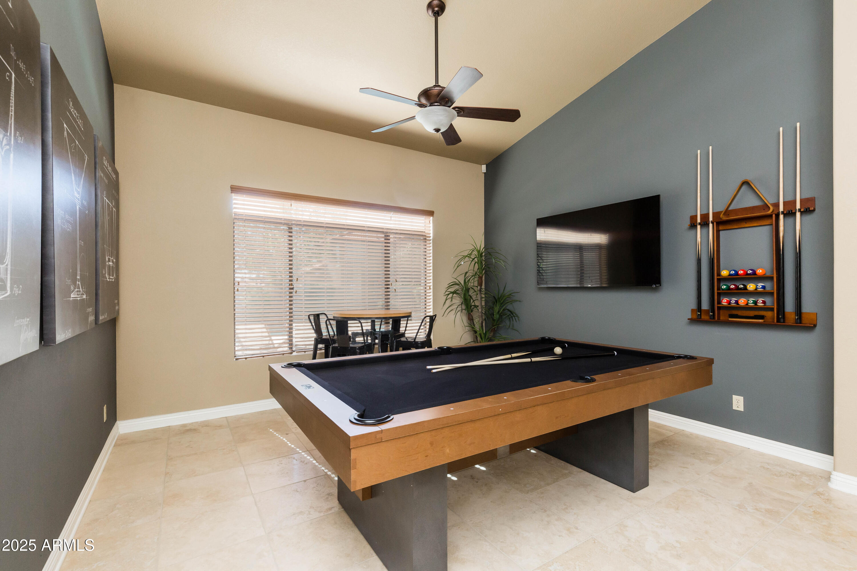 5821 East Aire Libre Avenue Scottsdale, AZ 85254 - Photo 12 of 35 a room with furniture and window