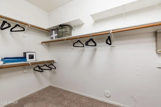 a view of small space with racks on the wall