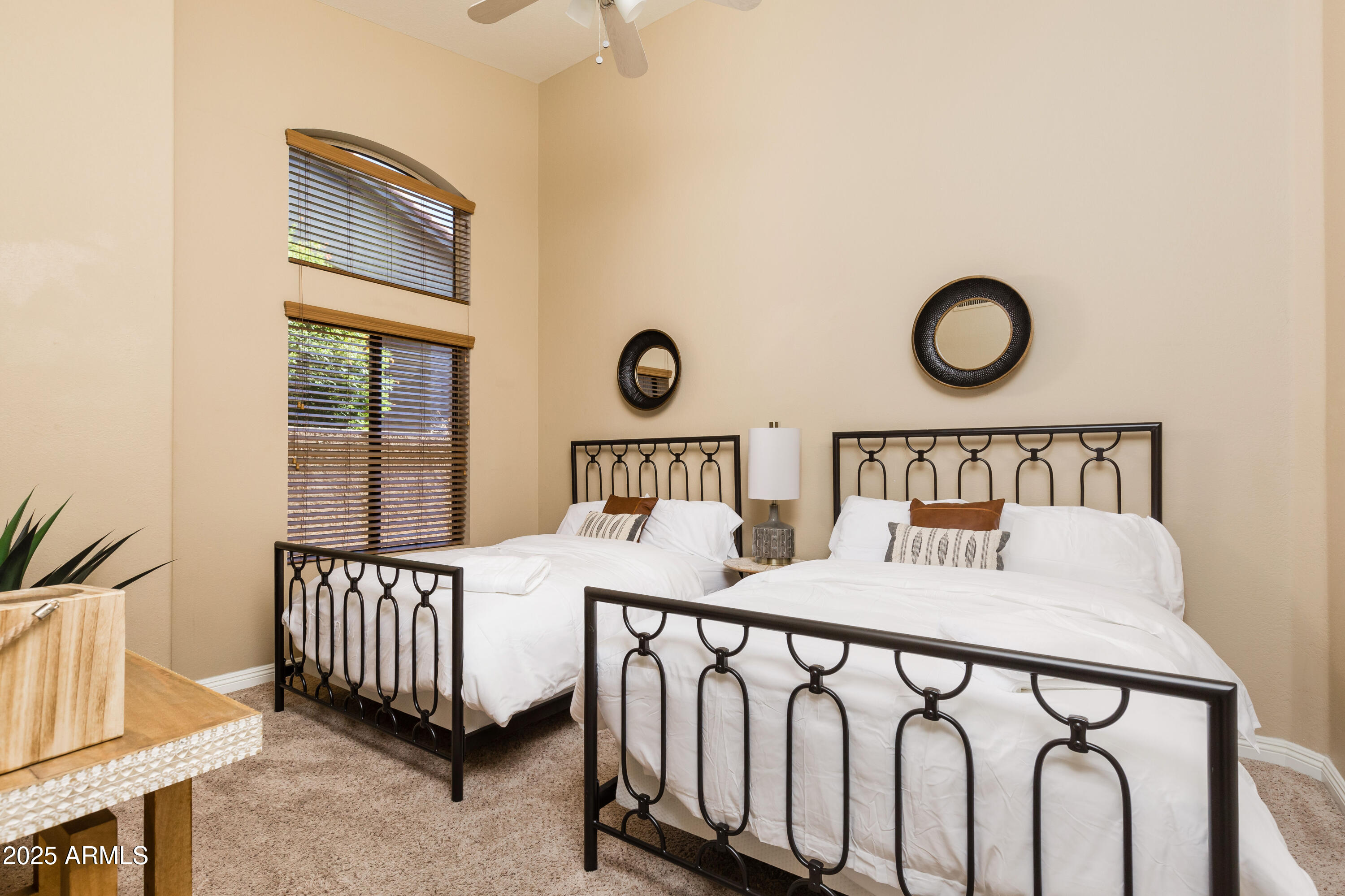 5821 East Aire Libre Avenue Scottsdale, AZ 85254 - Photo 21 of 35 a bedroom with a bed and a window