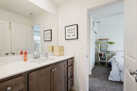 a bath room with a toilet and a bath tub