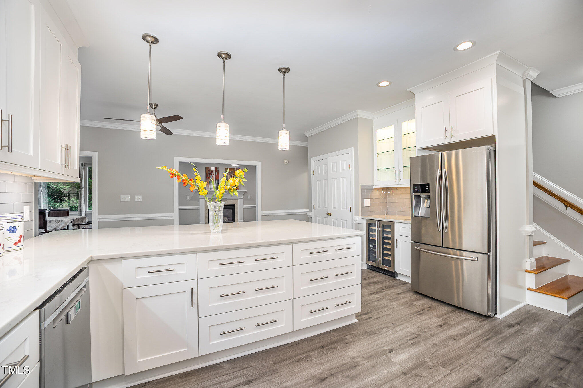 9400 Floral Ridge Court Raleigh, NC 27613 - Photo 12 of 35 a kitchen with stainless steel appliances granite countertop a refrigerator a sink and a stove