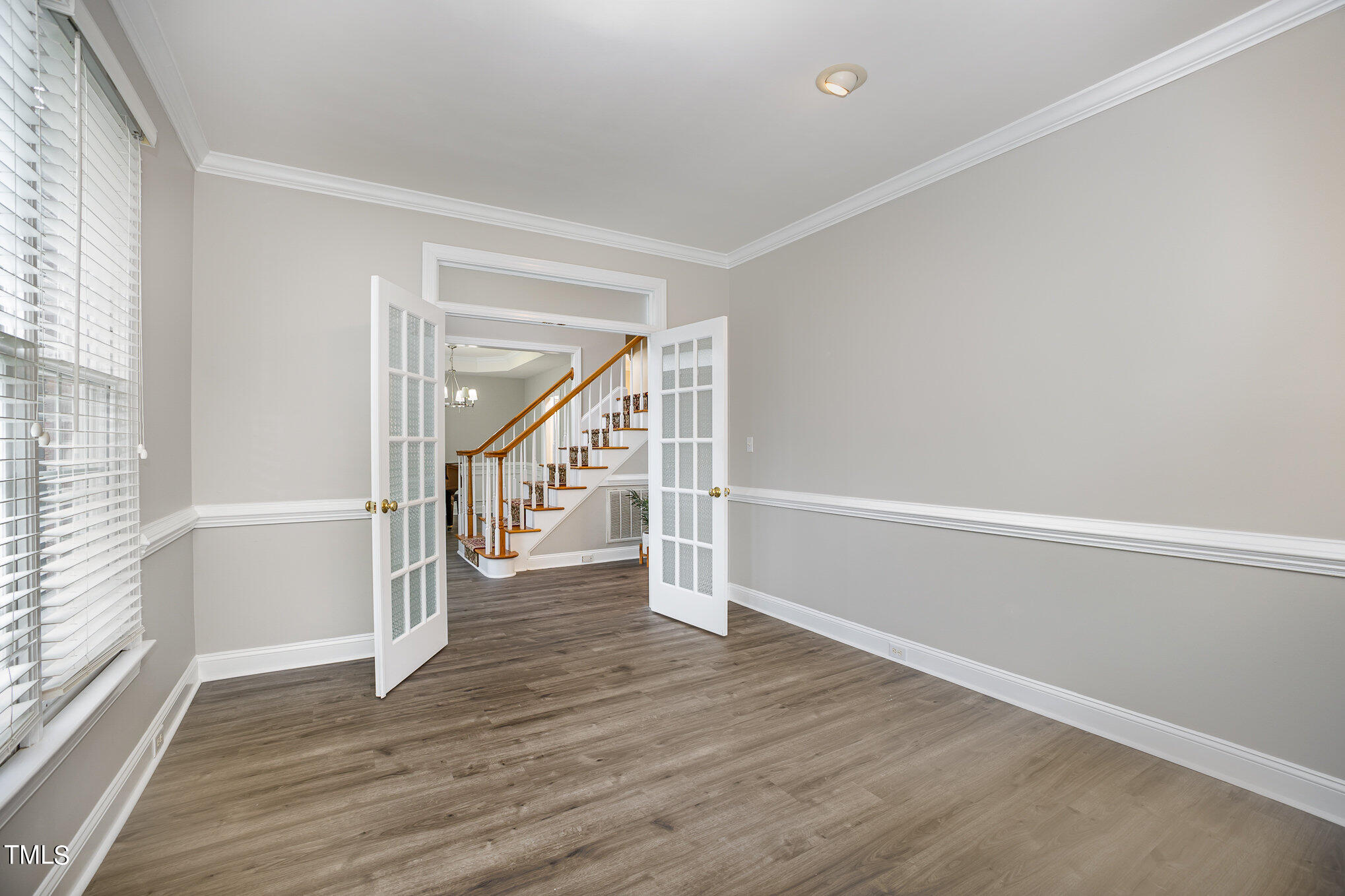 9400 Floral Ridge Court Raleigh, NC 27613 - Photo 17 of 35 a view of entryway with wooden floor