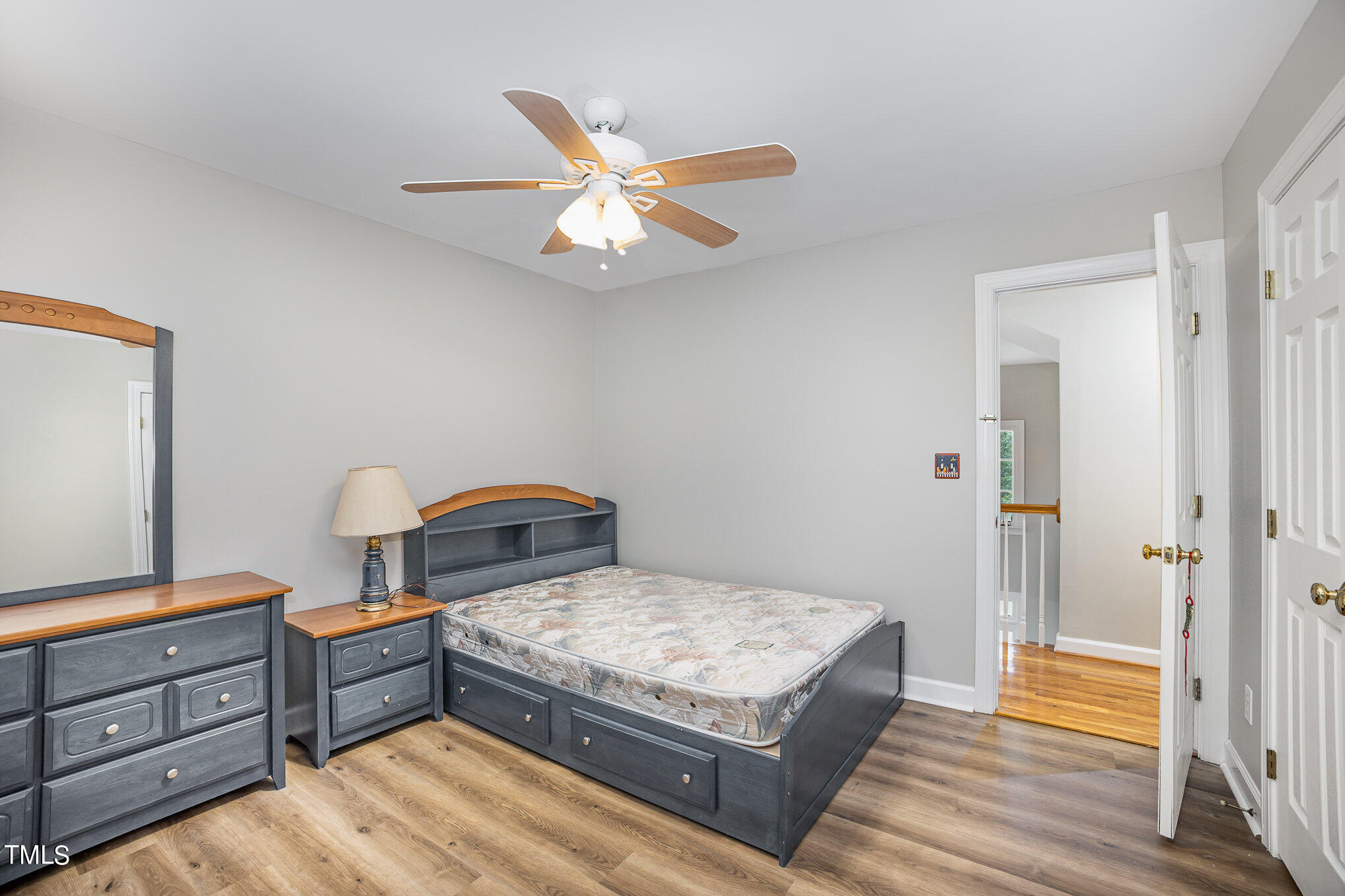 9400 Floral Ridge Court Raleigh, NC 27613 - Photo 20 of 35 a bedroom with two beds and a dresser
