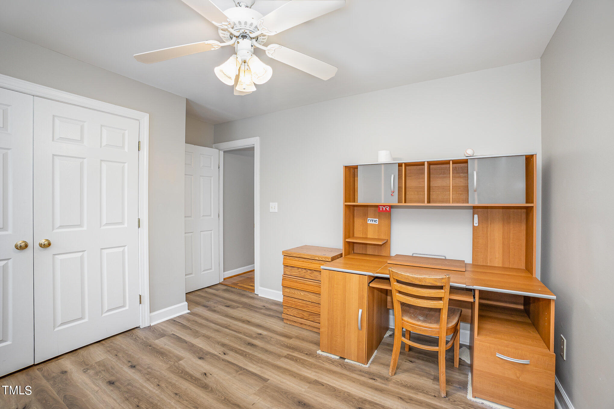 9400 Floral Ridge Court Raleigh, NC 27613 - Photo 23 of 35 a workspace with furniture and window