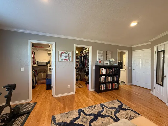 a view of a workspace with furniture