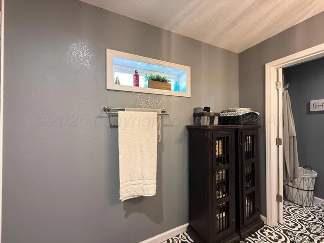 a view of a park with large trees