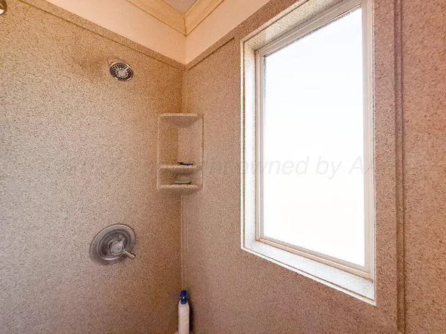 a front view of house with outdoor seating