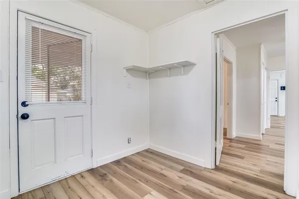 a view of a room that has a window in it