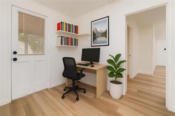 a bathroom with a sink toilet and mirror