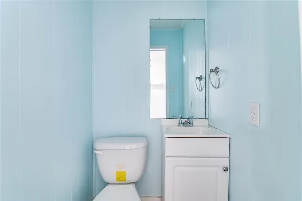 a view of outdoor space with wooden floor and windows