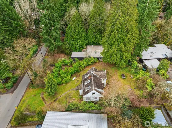 an aerial view of a house with a garden