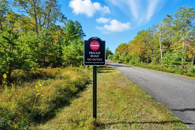a sign that is on the side of a road