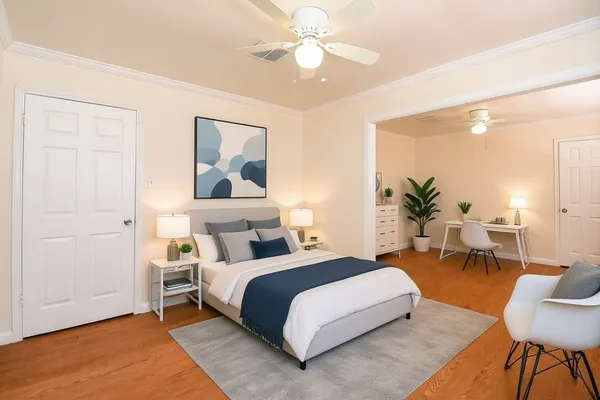 a view of a livingroom with a fireplace and window