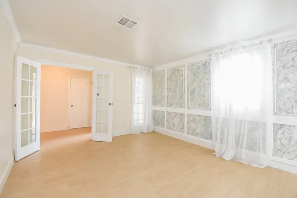 a view of a hallway with entryway