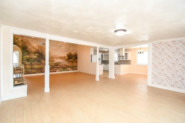 a view of an empty room with a window