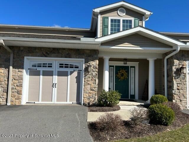118 Wyndham Road Clarks Summit, PA 18411 - Photo 21 of 21 a front view of a house with a yard