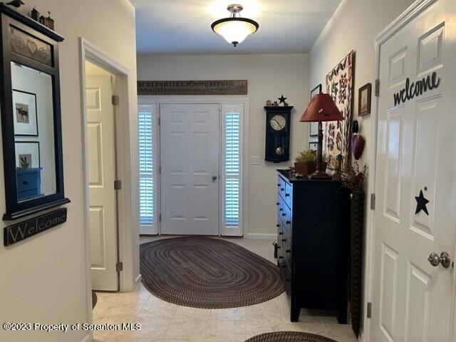 118 Wyndham Road Clarks Summit, PA 18411 - Photo 4 of 21 a bedroom with a bed and a mirror