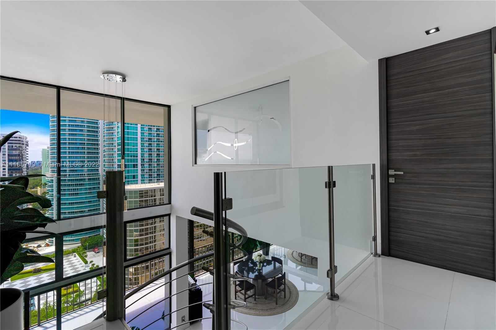 1925 Brickell Avenue, Unit DPH7 Miami, FL 33129 - Photo 20 of 37 a view of a hallway with workspace