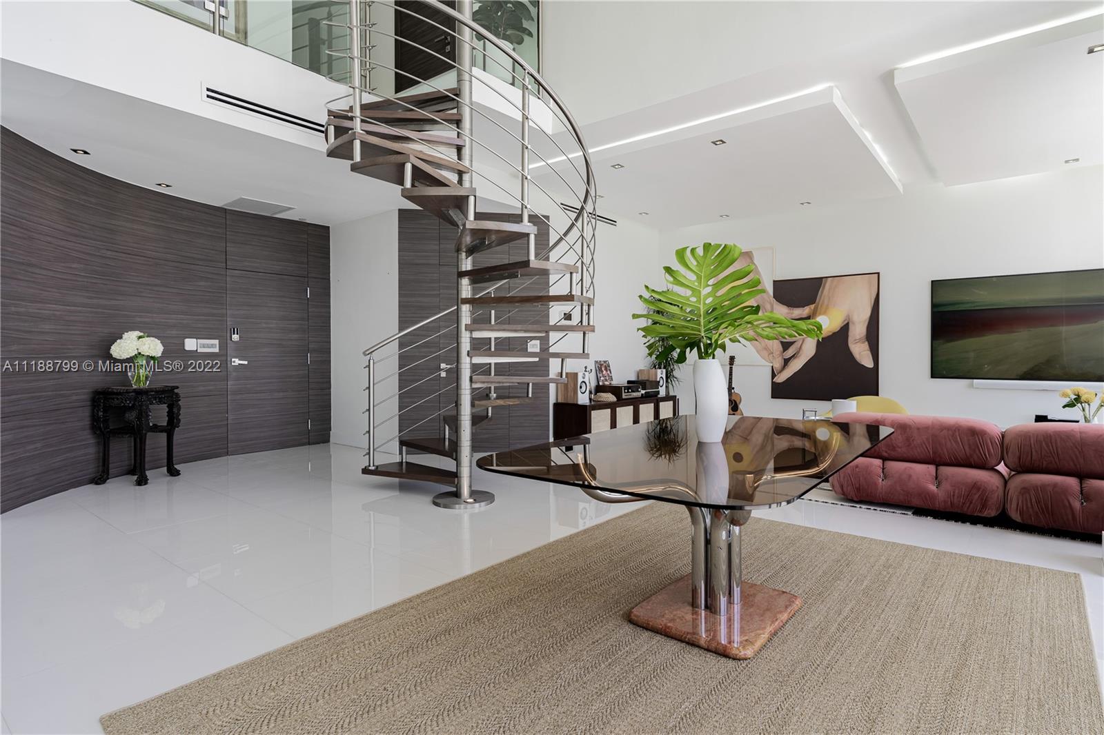 1925 Brickell Avenue, Unit DPH7 Miami, FL 33129 - Photo 3 of 37 a living room with furniture and potted plants