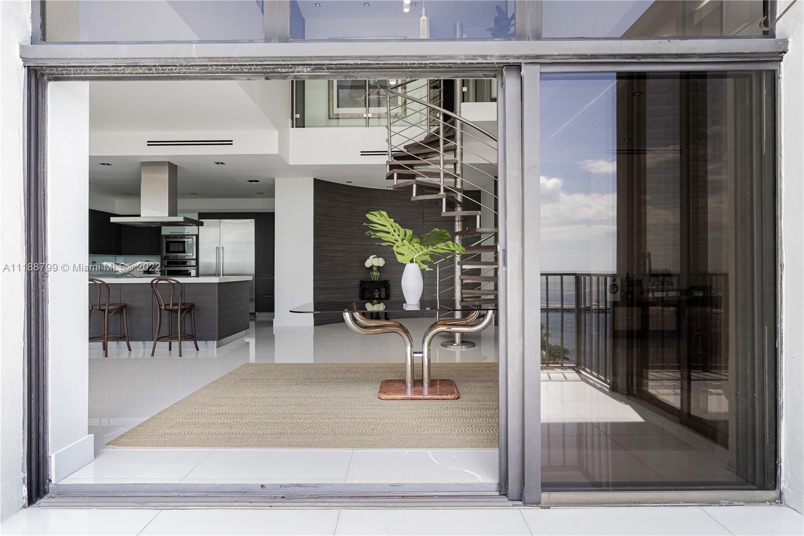 1925 Brickell Avenue, Unit DPH7 Miami, FL 33129 - Photo 31 of 37 a view of a living room and kitchen