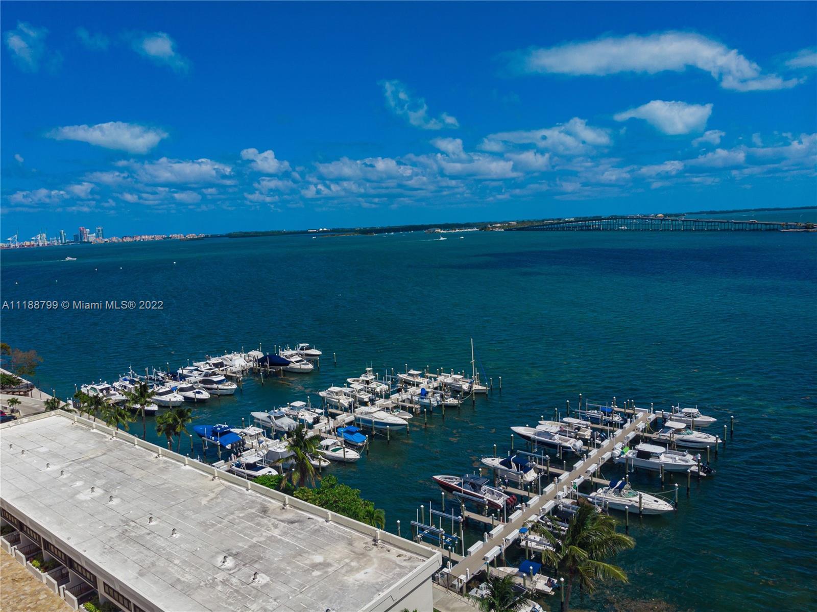 1925 Brickell Avenue, Unit DPH7 Miami, FL 33129 - Photo 35 of 37 a view of a lake with a mountain