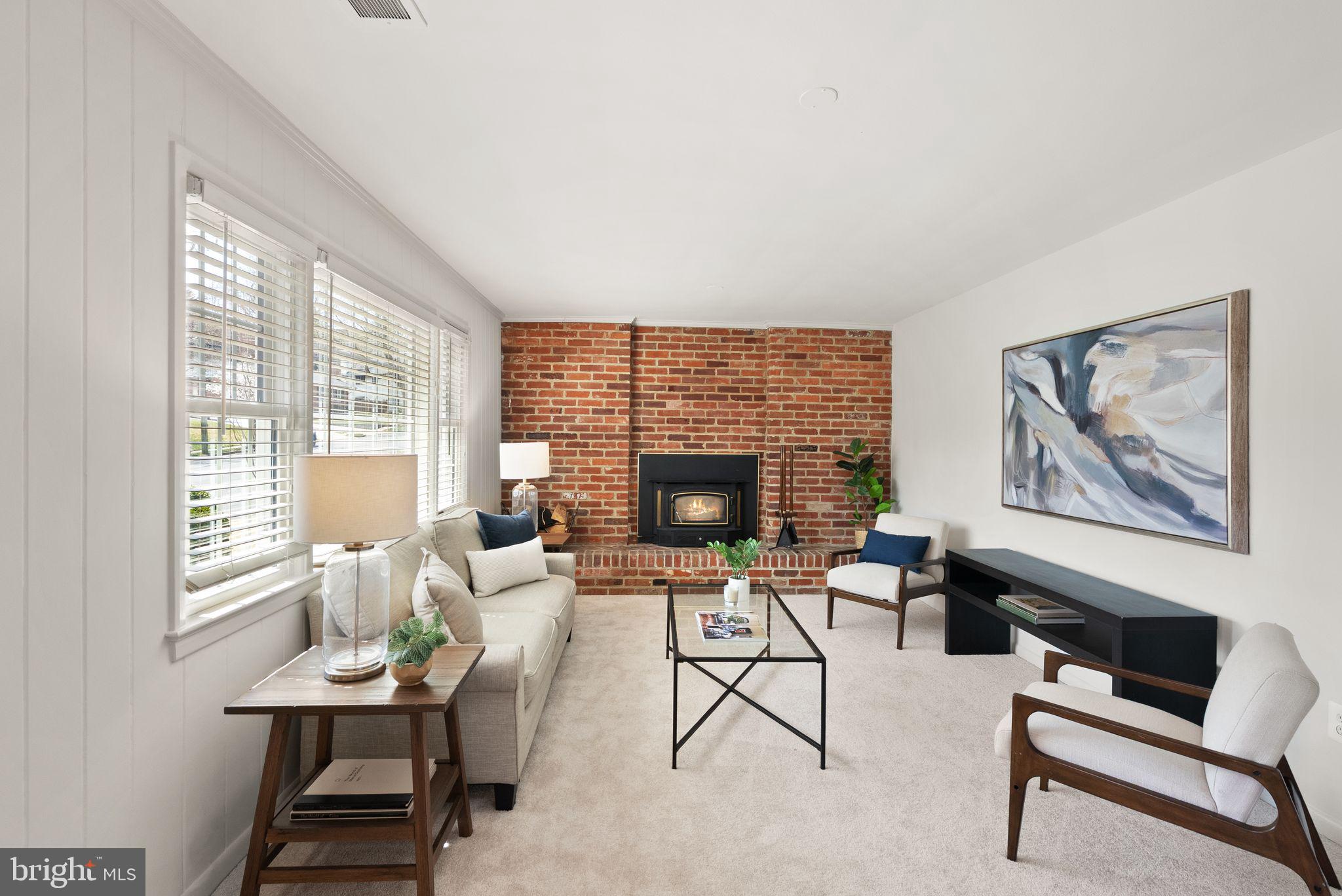 3802 Cameron Mills Road Alexandria, VA 22305 - Photo 35 of 64 Cozy Recreation Room with Wood Burning Fireplace
