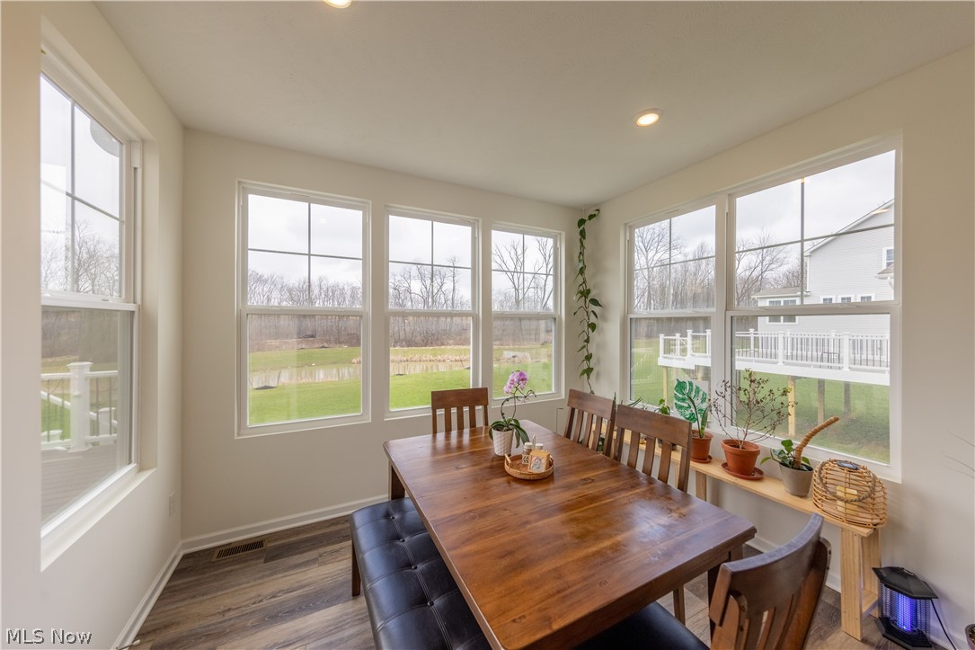 766 River Run Road Aurora, OH 44202 - Photo 20 of 49 Dining room/Sunroom with dark wood-style flooring and recessed lighting