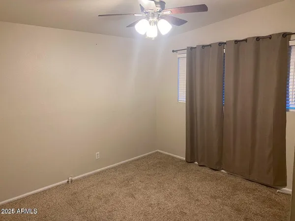 a view of a livingroom with a flat screen tv
